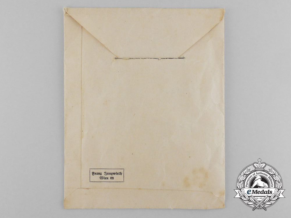 a_bronze_grade_mother’s_cross_with_original_packet_of_issue_d_0215