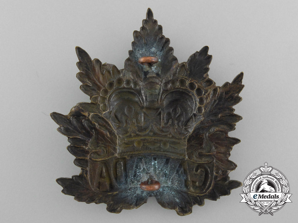 canada._a_pith_helmet_cap_badge,_c1900_d_0559