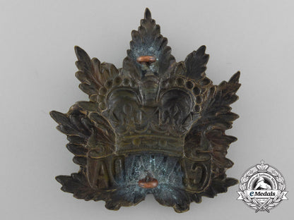 canada._a_pith_helmet_cap_badge,_c1900_d_0559