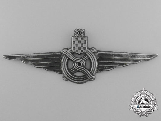 a_second_war_croatian_railway_officer's_peaked_cap_badge_d_0627_1