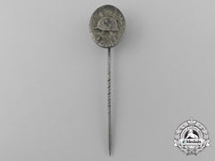 A Miniature Wound Badge; Silver Grade Stickpin