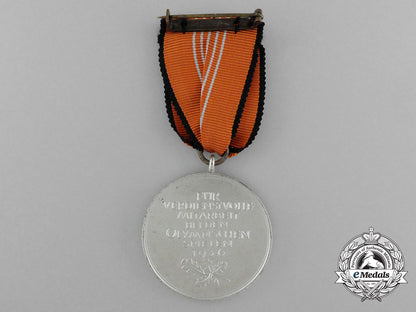an_absolutely_mint1936_berlin_olympic_games_commemorative_medal_in_its_original_case_of_issue_d_0763_1