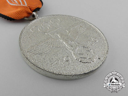 an_absolutely_mint1936_berlin_olympic_games_commemorative_medal_in_its_original_case_of_issue_d_0764_1