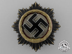 A Fine Quality German Cross In Gold By Deschler