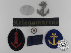 A Lot Of Seven Kriegsmarine Insignia And Identification Tags