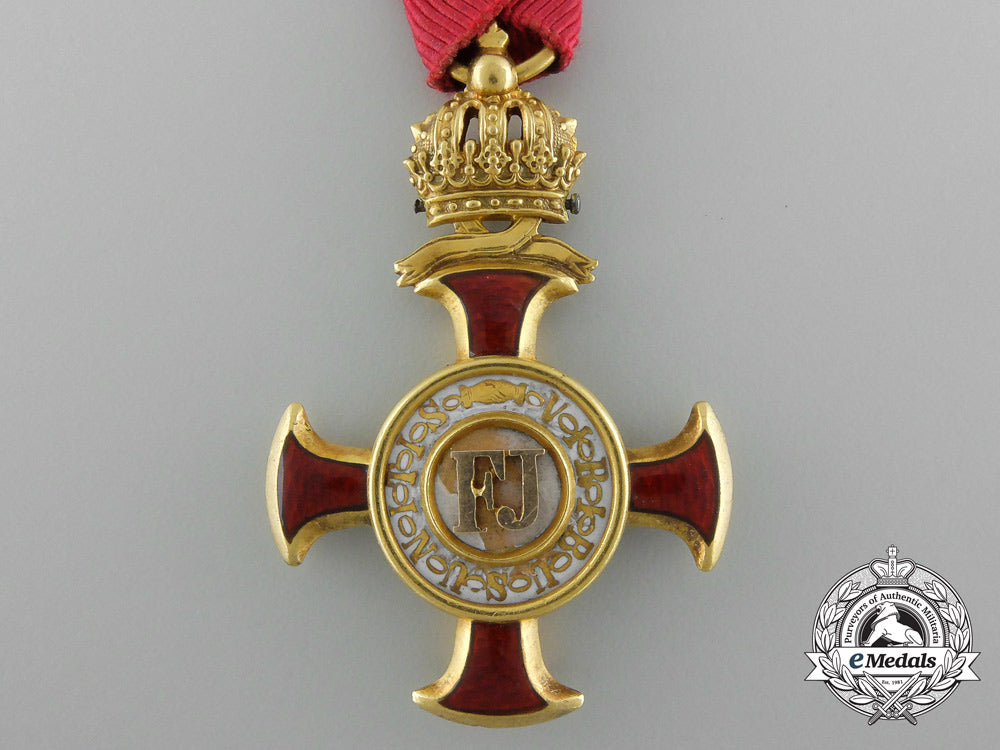austria,_empire._a_golden_cross_of_merit_with_crown_by,_braun_of_vienna_d_1023