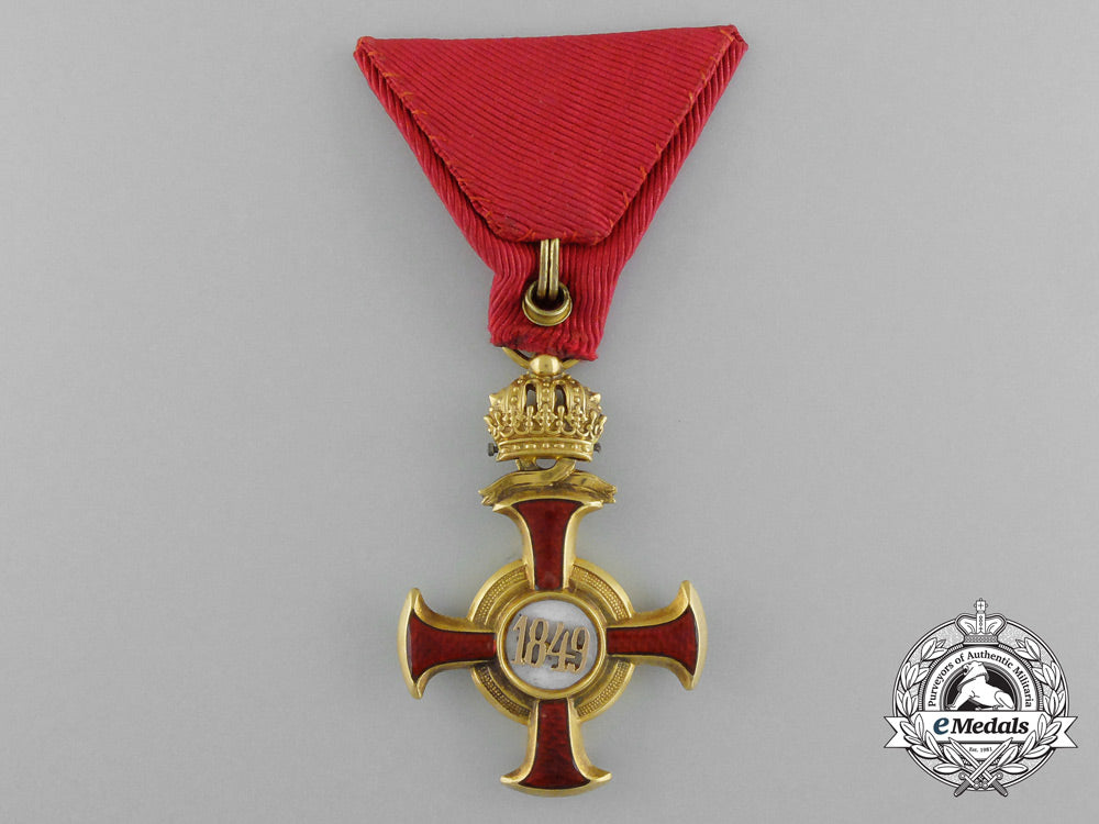 austria,_empire._a_golden_cross_of_merit_with_crown_by,_braun_of_vienna_d_1025