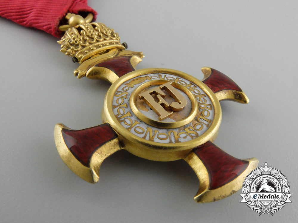austria,_empire._a_golden_cross_of_merit_with_crown_by,_braun_of_vienna_d_1026