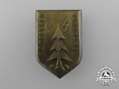 A 1934 Hj/Dj District Tann Rally Badge