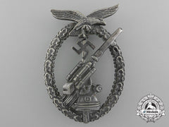 An Early Luftwaffe Flak Badge In Tombac With Ball Hinge