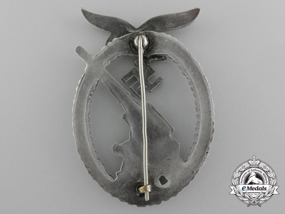 an_early_luftwaffe_flak_badge_in_tombac_with_ball_hinge_d_1286