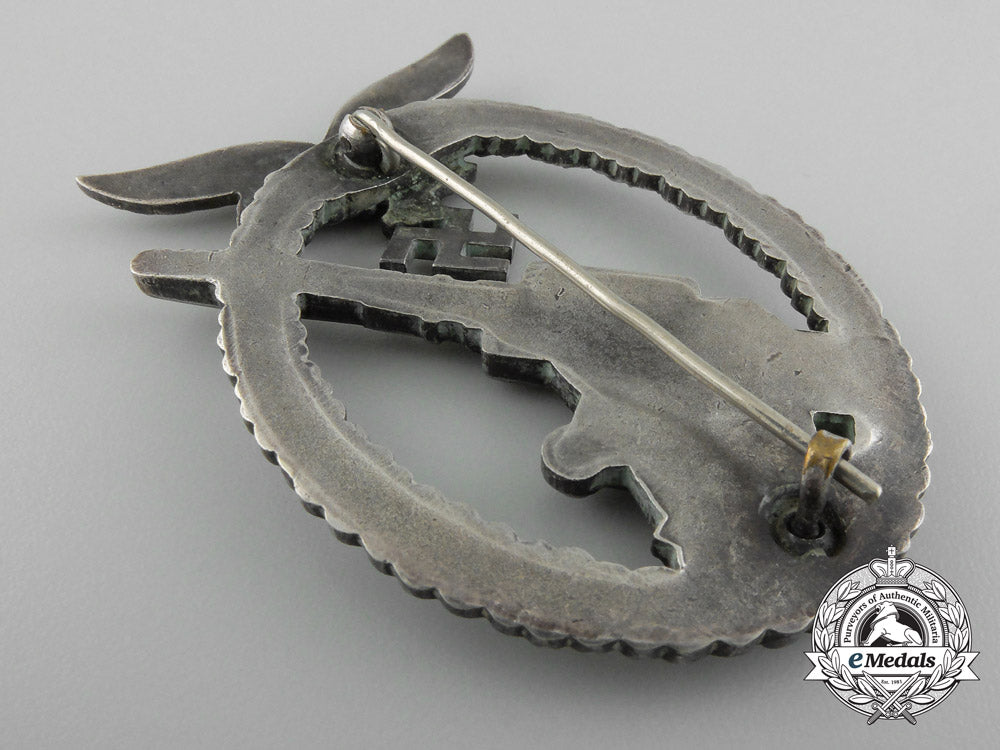 an_early_luftwaffe_flak_badge_in_tombac_with_ball_hinge_d_1288