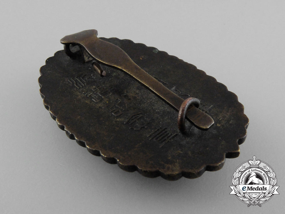 a_japanese_manchu_kwantung_army_dispatch_badge_for_loyalty_and_bravery;_boxed_d_1393_1