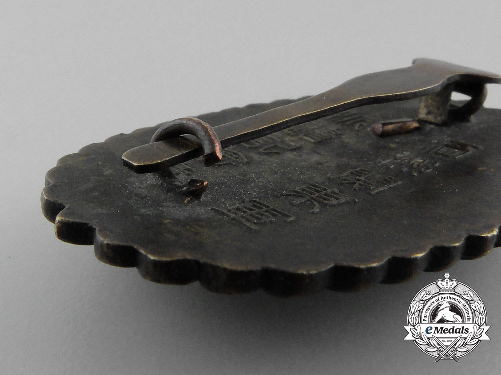 a_japanese_manchu_kwantung_army_dispatch_badge_for_loyalty_and_bravery;_boxed_d_1394_1