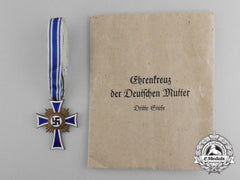 A Bronze Grade Mother’s Cross With Original Packet Of Issue By Karl Wurster