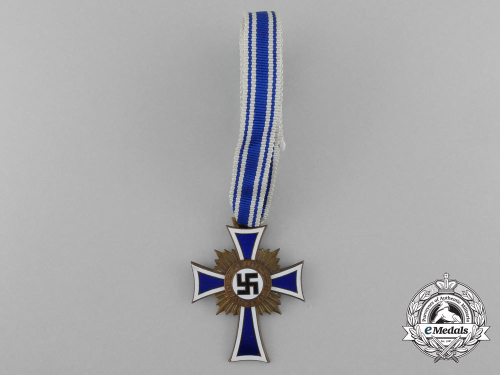 a_bronze_grade_mother’s_cross_with_original_packet_of_issue_by_karl_wurster_d_1477_1