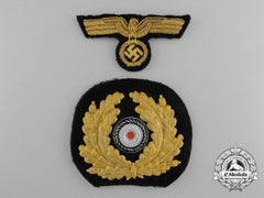 A Set Of Kriegsmarine Navy Officer Peak Cap Badges