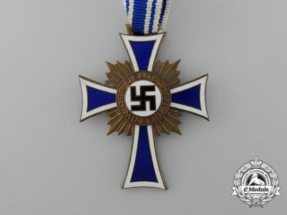 a_bronze_grade_mother’s_cross_with_original_packet_of_issue_by_karl_wurster_d_1478_1