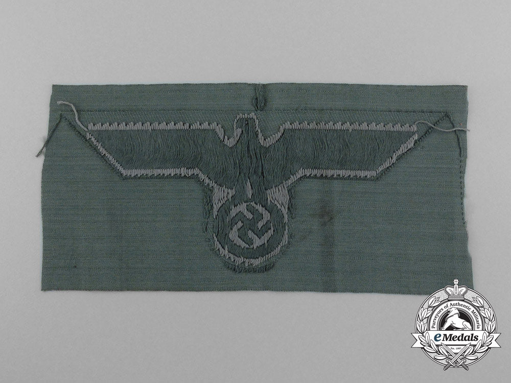 an_em/_nco’s_m43_army_trapezoid_cap_insignia_d_1560_1