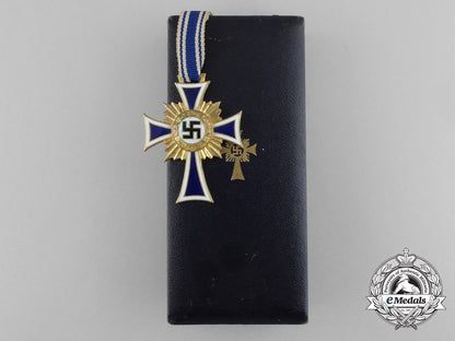 a_gold_grade_mother’s_cross_with_original_case_of_issue_by_c.e.juncker_d_1652
