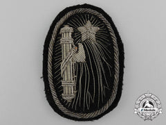 An Italian Fascist Bullion Cap Badge