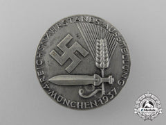 A 1937 Munich Reichsnährstand 4Th Exhibition Badge By Deschler & Sohn
