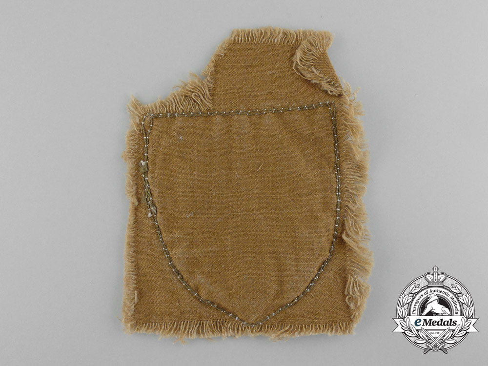 an_arm_badge_for_a_standard-_bearer_of_an_hj_gefolgschaft;_with_section_of_tunic_d_1814