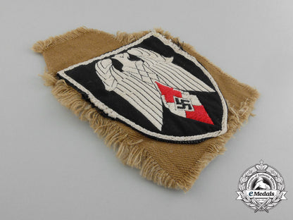an_arm_badge_for_a_standard-_bearer_of_an_hj_gefolgschaft;_with_section_of_tunic_d_1815