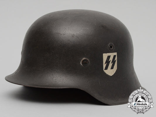 an_outstanding_m42_waffen-_ss_combat_helmet_with_single_c.a._pocher_reverse_decal_d_1966