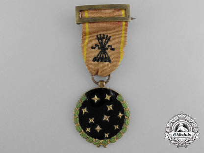 spain,_fascist_state._a_party_member's_medal;_named_d_2271