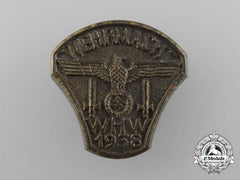 A 1938 Wehrmacht “People’s Winter Aid” Donation Badge