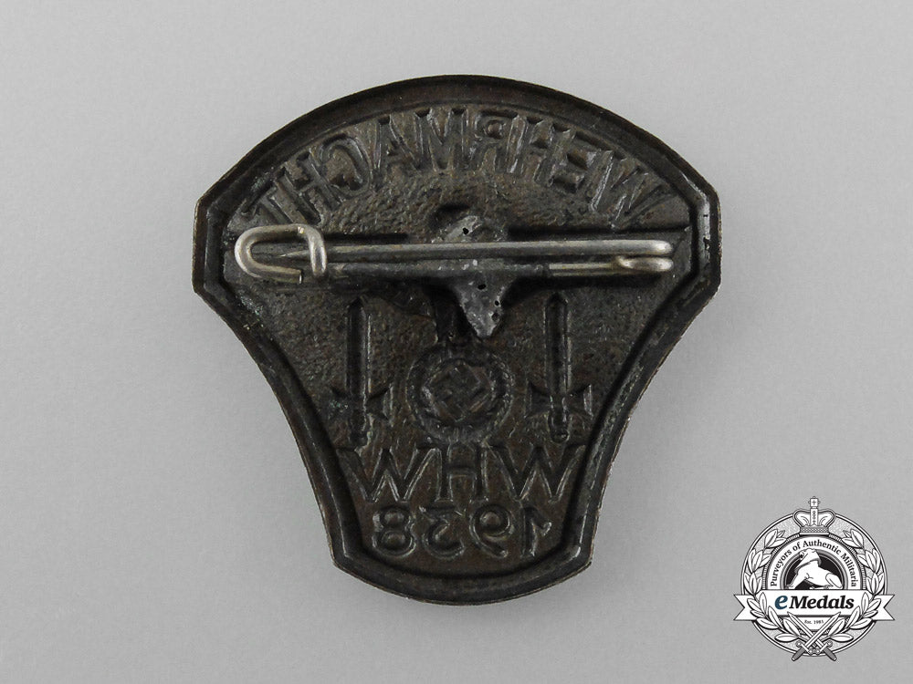 a1938_wehrmacht“_people’s_winter_aid”_donation_badge_d_2399_1