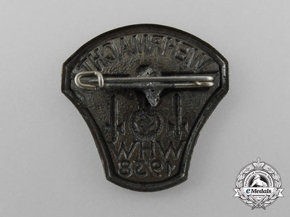 a1938_wehrmacht“_people’s_winter_aid”_donation_badge_d_2399_1