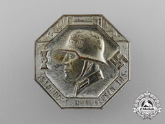 A Third Reich Period “People’s Winter Aid” Wehrmacht Mühlhausen Garrison Badge