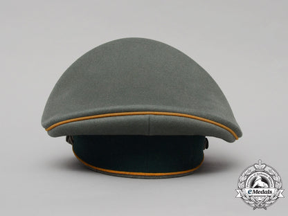 a_wehrmacht_heer(_army)_cavalry_officer_visor_cap_by_b-_hamkens,_hamburg_d_2773_1