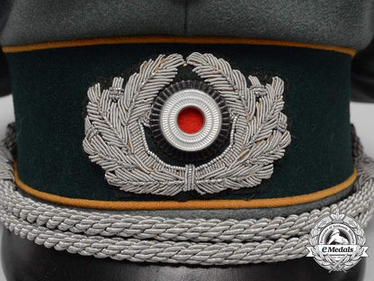 a_wehrmacht_heer(_army)_cavalry_officer_visor_cap_by_b-_hamkens,_hamburg_d_2776_1