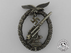 An Early Luftwaffe Flak Badge In Tombac With Ball Hinge