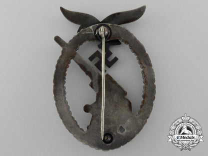 an_early_luftwaffe_flak_badge_in_tombac_with_ball_hinge_d_2858_1