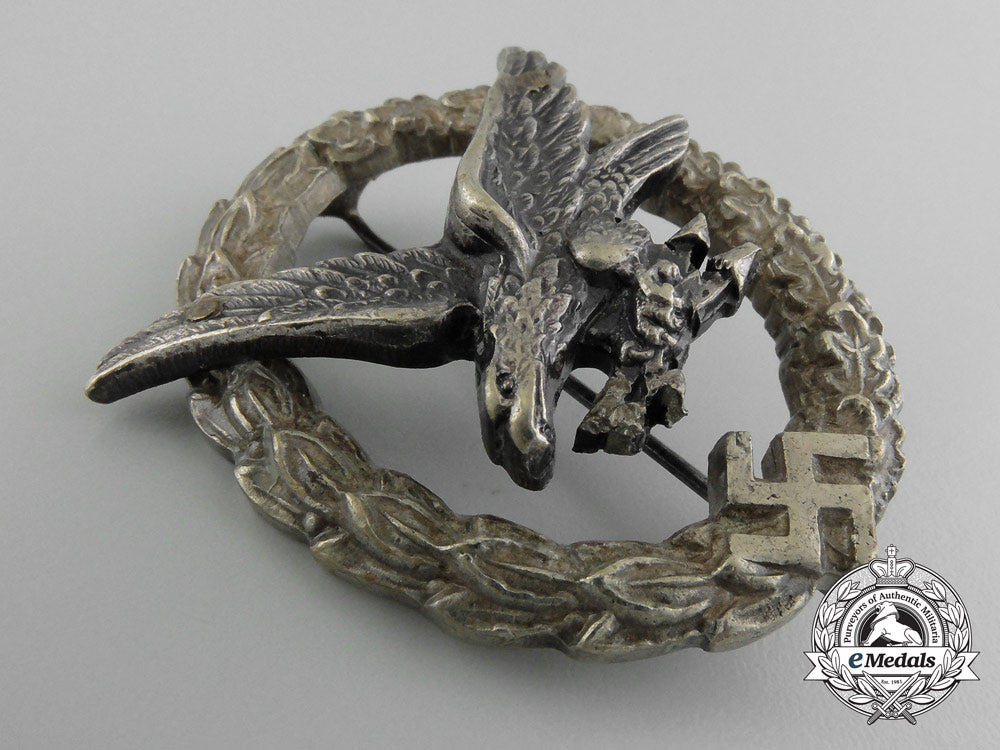 a_cased_luftwaffe_radio_operator&_air_gunner_badge_by_c.e.juncker_d_2863