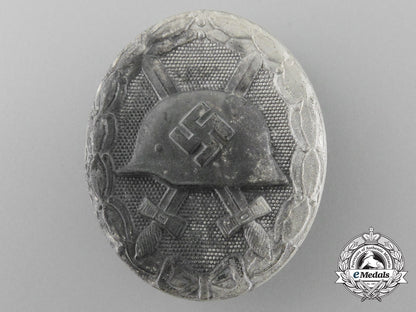 a_fine_silver_grade_wound_badge_by_carl_wild_with_original_packet_of_issue_d_3003_1