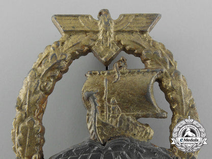 a_kriegsmarine_naval_auxiliary_cruiser_badge_d_3014
