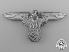 A Waffen-Ss Officer’s Visor Cap Eagle By Ferdinand Wagner