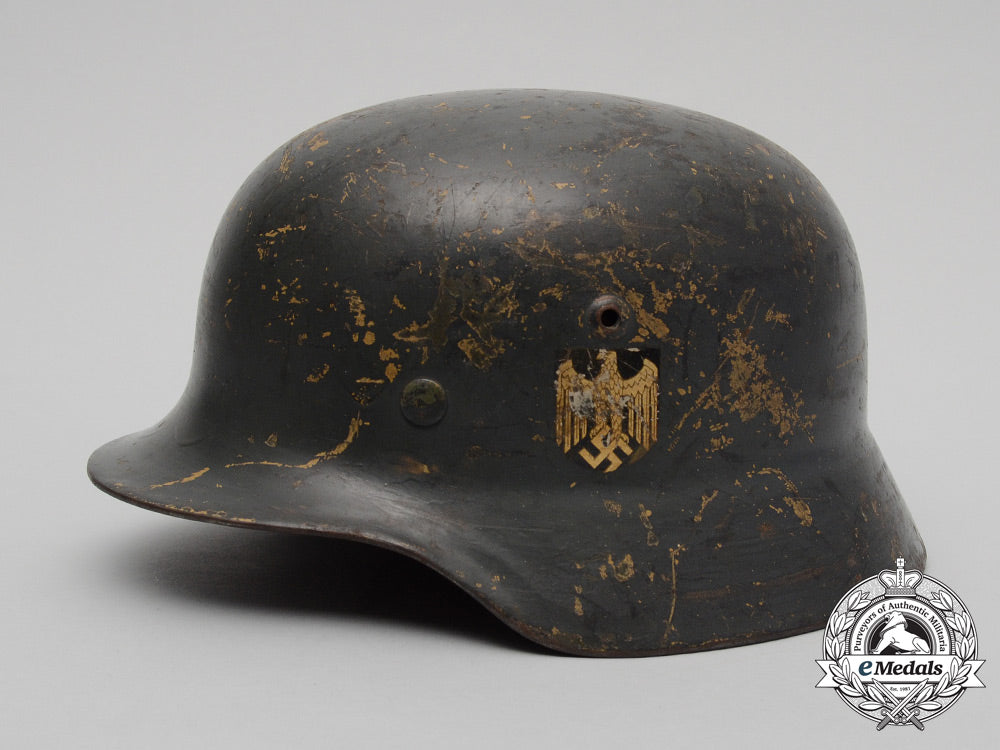 an_m35_single_decal_ex-_tropical_wehrmacht_heer(_army)_stahlhelm_by_firma_f.w._quist_d_3431