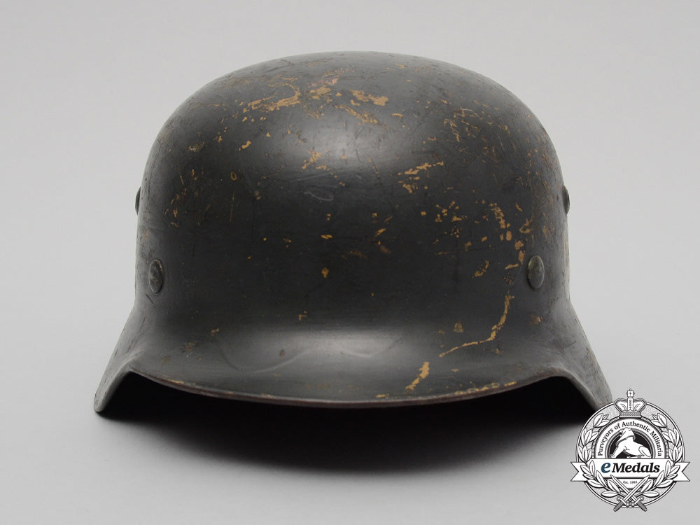 an_m35_single_decal_ex-_tropical_wehrmacht_heer(_army)_stahlhelm_by_firma_f.w._quist_d_3432