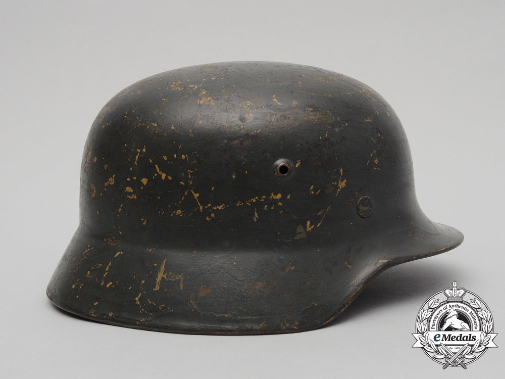 an_m35_single_decal_ex-_tropical_wehrmacht_heer(_army)_stahlhelm_by_firma_f.w._quist_d_3433