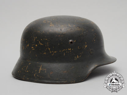 an_m35_single_decal_ex-_tropical_wehrmacht_heer(_army)_stahlhelm_by_firma_f.w._quist_d_3433