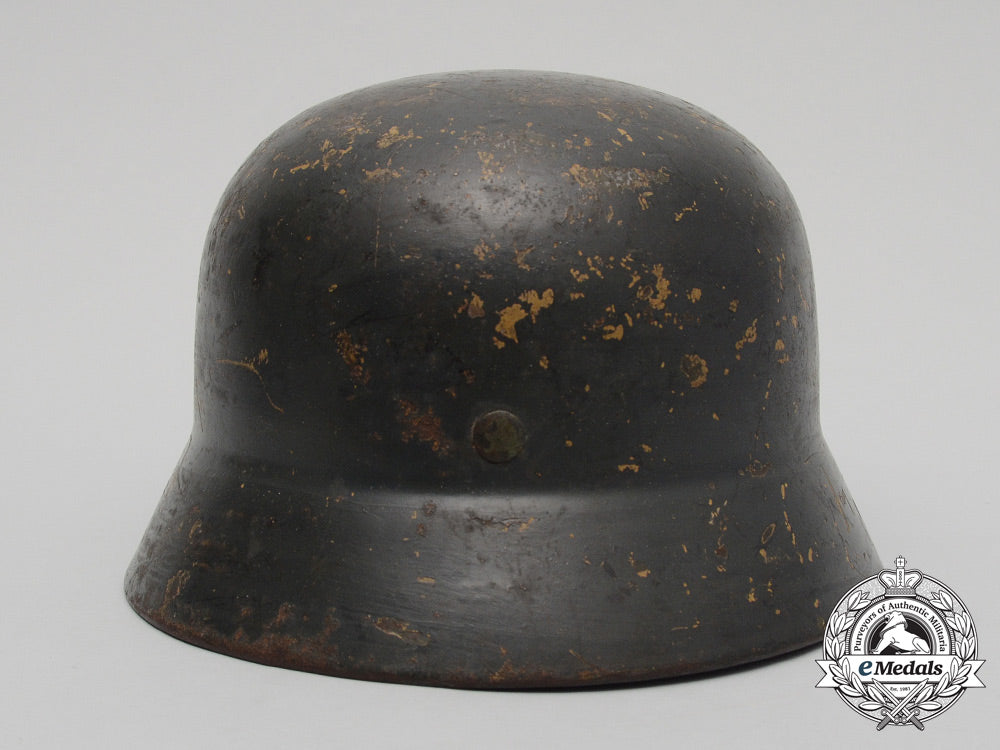 an_m35_single_decal_ex-_tropical_wehrmacht_heer(_army)_stahlhelm_by_firma_f.w._quist_d_3434
