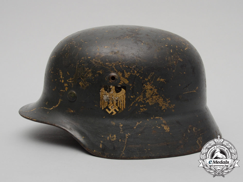 an_m35_single_decal_ex-_tropical_wehrmacht_heer(_army)_stahlhelm_by_firma_f.w._quist_d_3435