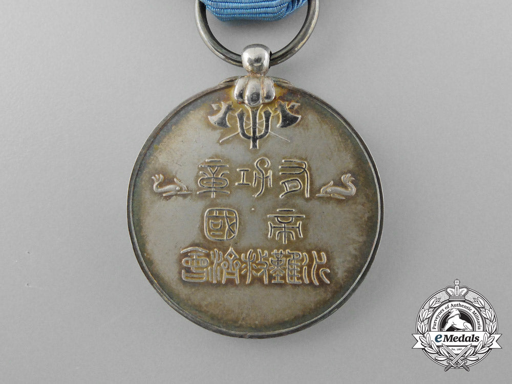 a_japanese_imperial_sea_disaster_rescue_society_merit_medal;3_rd_class_d_3475_1