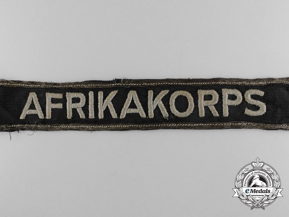 a_rare_afrika_korps_panzer_officer’s_campaign_cufftitle;_tunic_removed_d_3702
